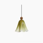 Meblo mid-century modern pendant light with green gradient ruffled glass shade and wooden accent, studio front view