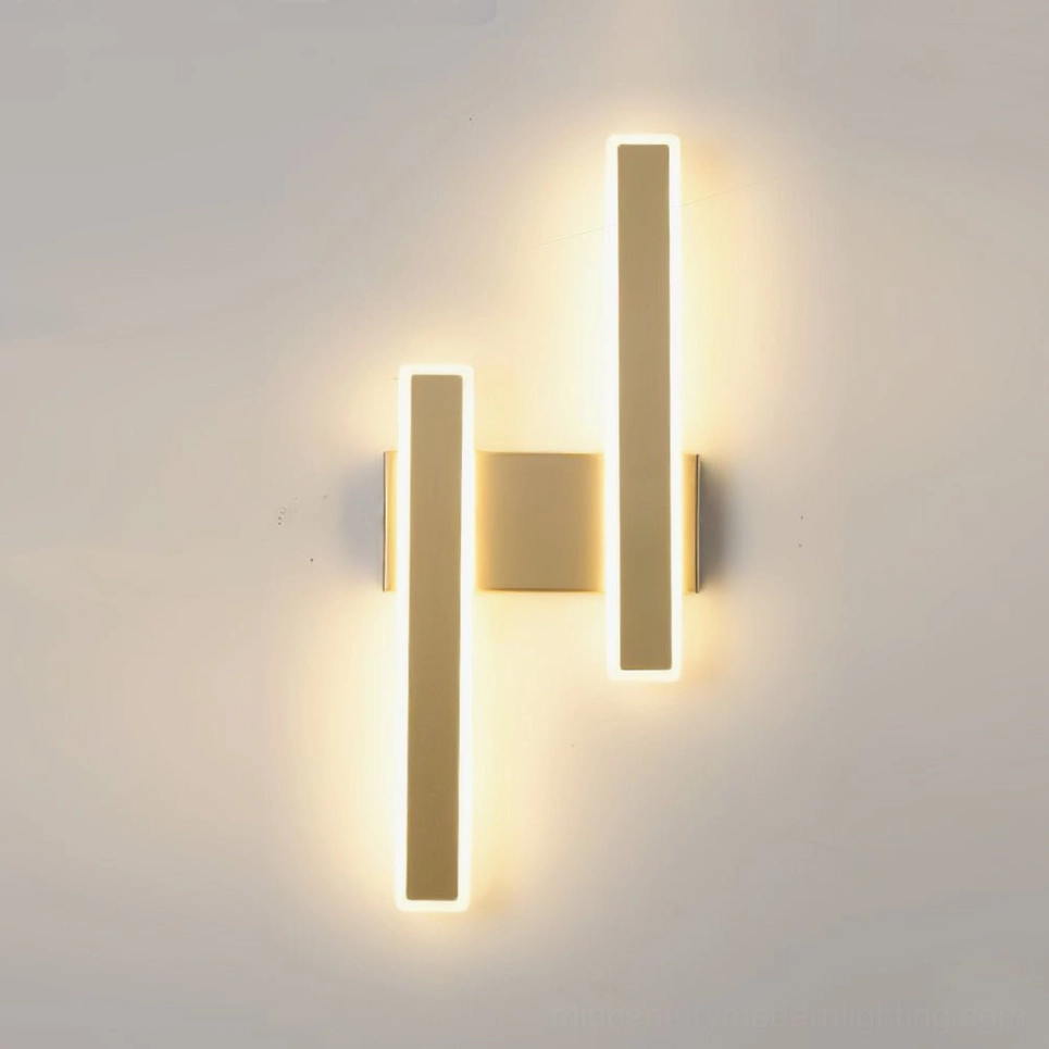 Mel wall sconce brushed gold finish with warm LED illumination - contemporary geometric lighting close-up