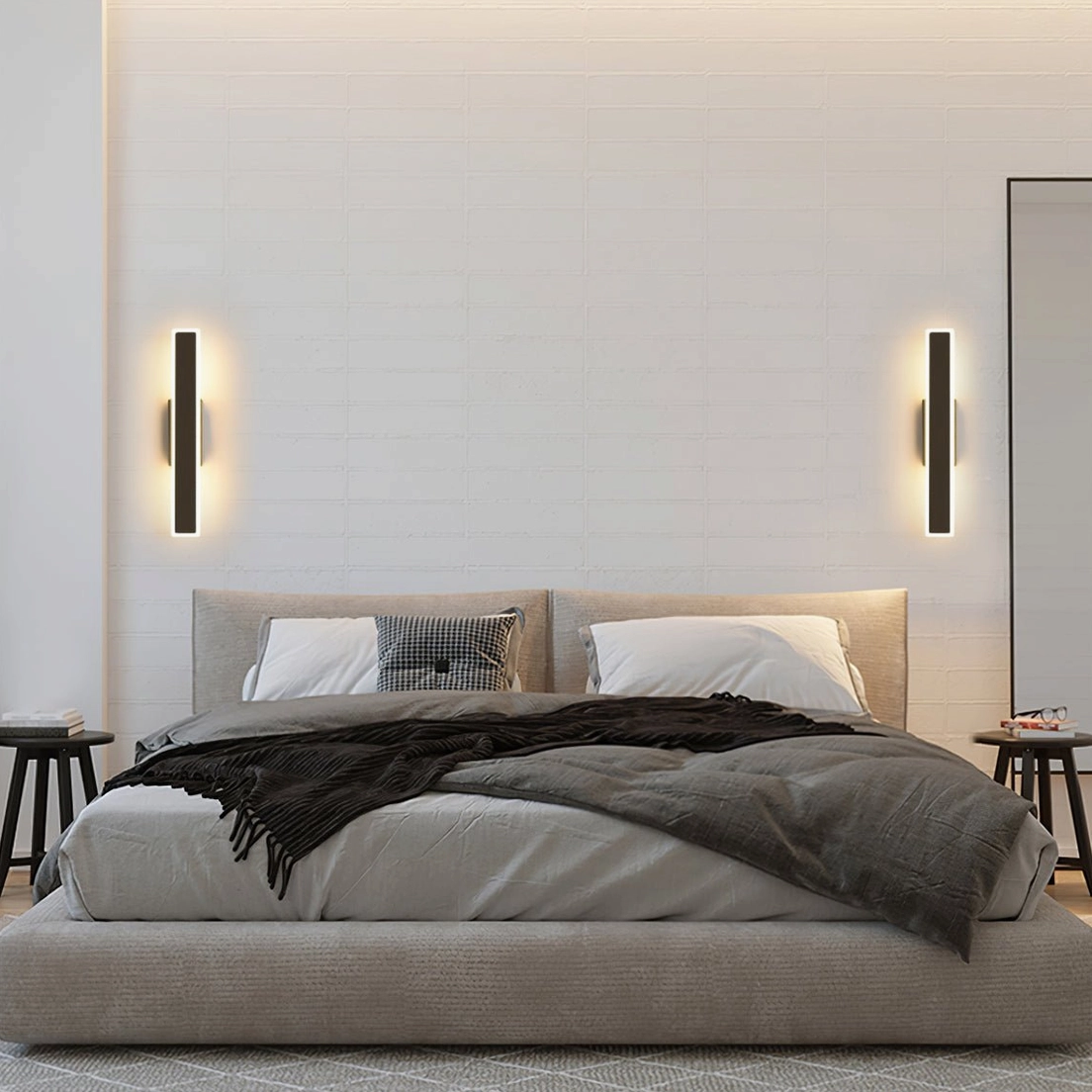 Paired Mel wall sconces flanking bed headboard - modern bedroom ambient lighting design