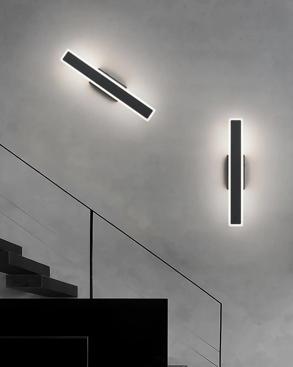 Linear Mel wall sconces installed along stairwell - minimalist modern hallway geometric LED lighting