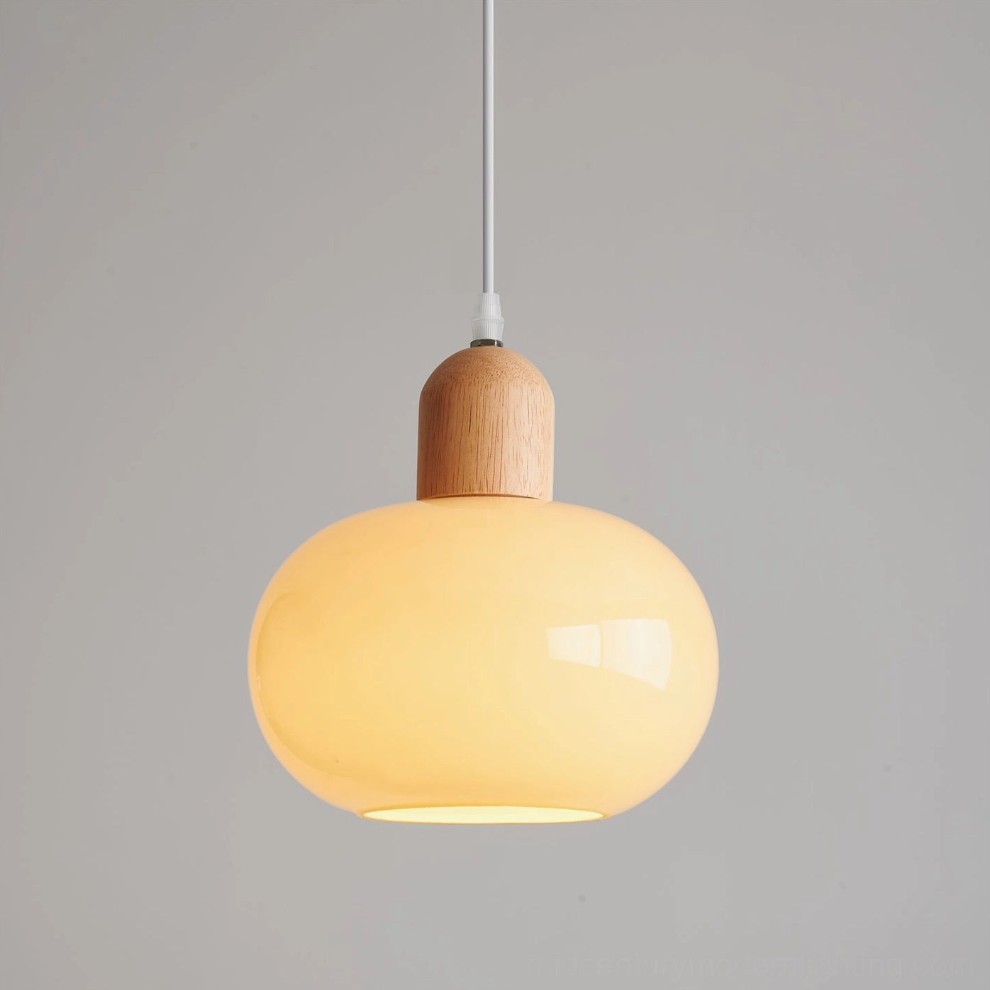Mellow pendant lighting fixtures in mid-century modern interior design setting, demonstrating aesthetic versatility
