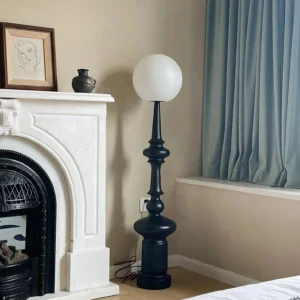 Melrose spherical floor lamp styled in classic fireplace living room interior design with neutral home decor