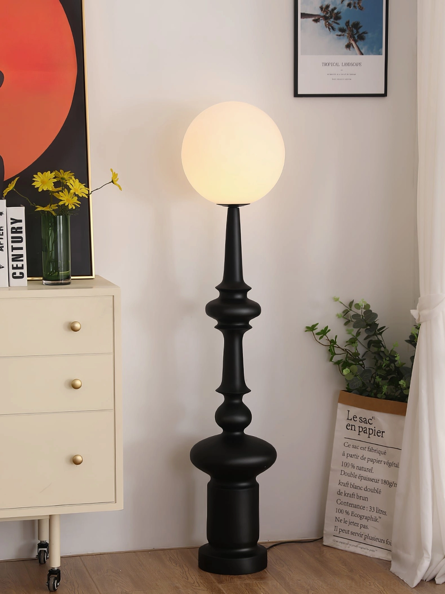 Melrose modern floor lamp minimalist home corner white dresser wall art potted plants