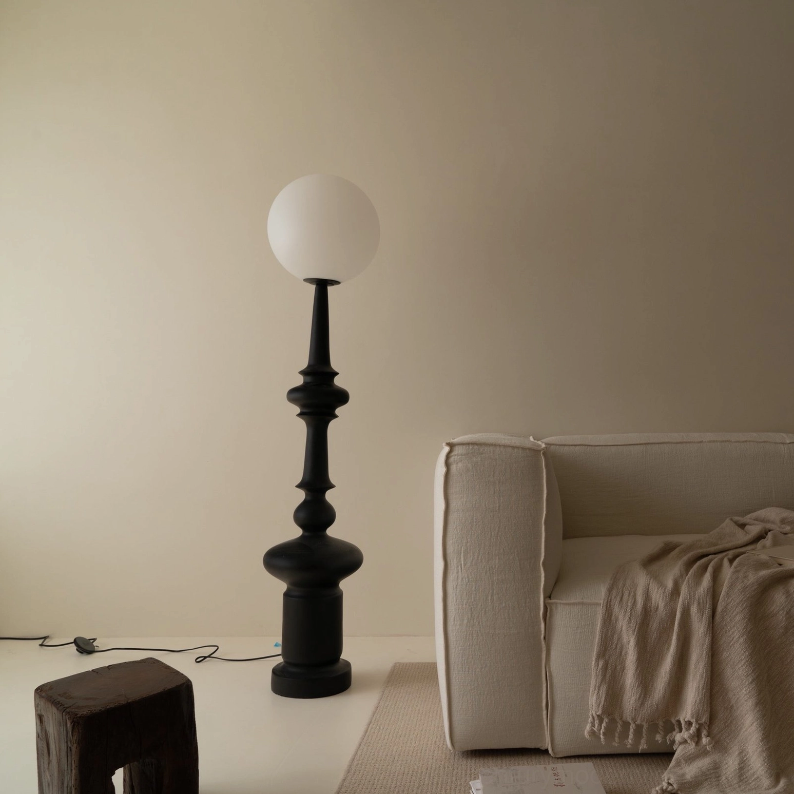 Melrose mid-century floor lamp minimalist beige living room paired with fabric sofa and stool