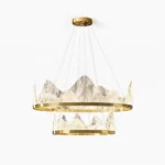 Mendez Modern dual-tier mountain chandelier in brushed gold finish with marbled acrylic diffusers - front studio view
