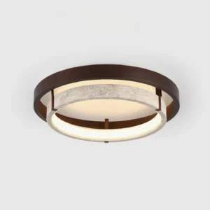 Three-quarter angle view of modern travertine ceiling light with dual-layer ring structure and warm LED glow