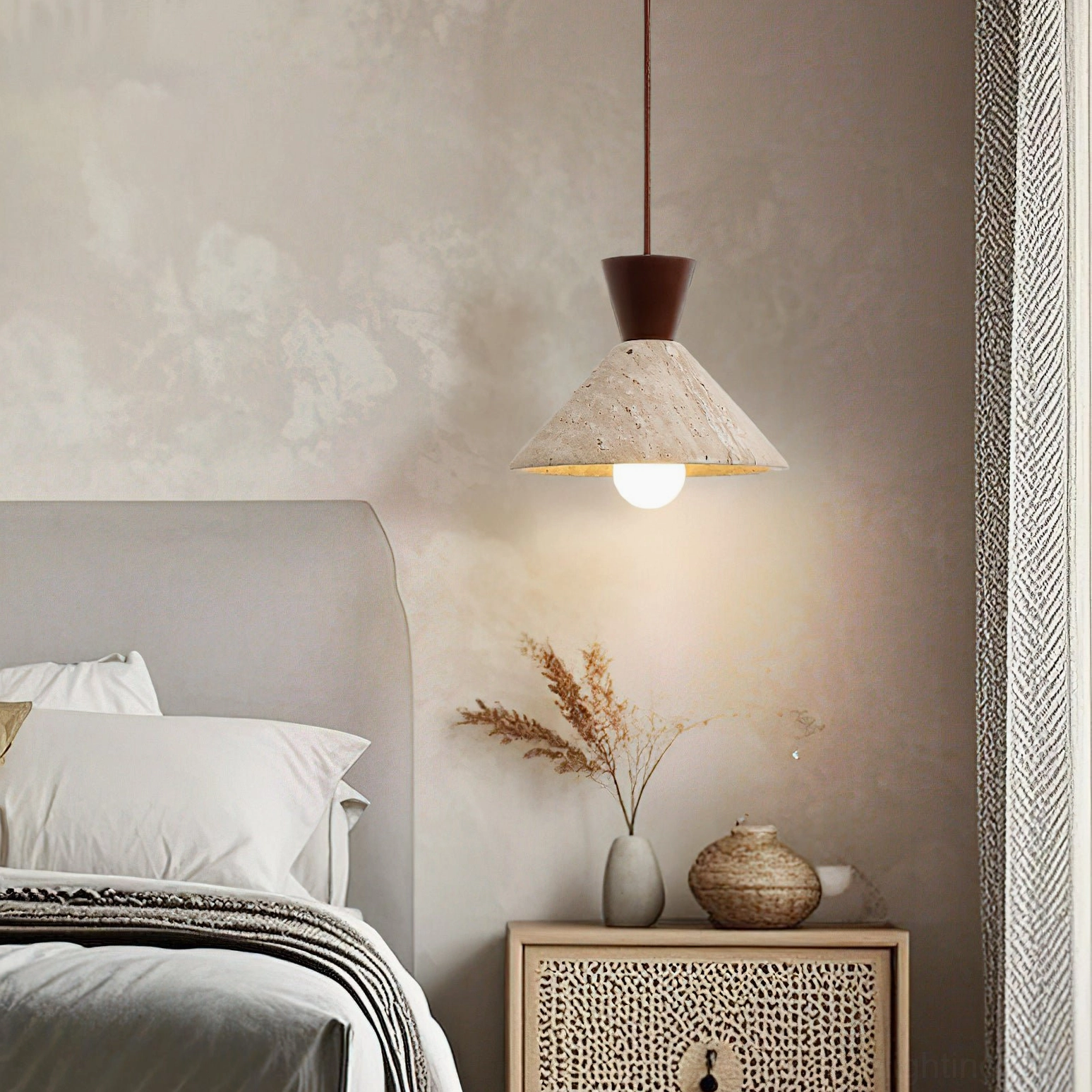 Single Menra travertine pendant light in cozy bedroom interior wabi-sabi minimalist decor