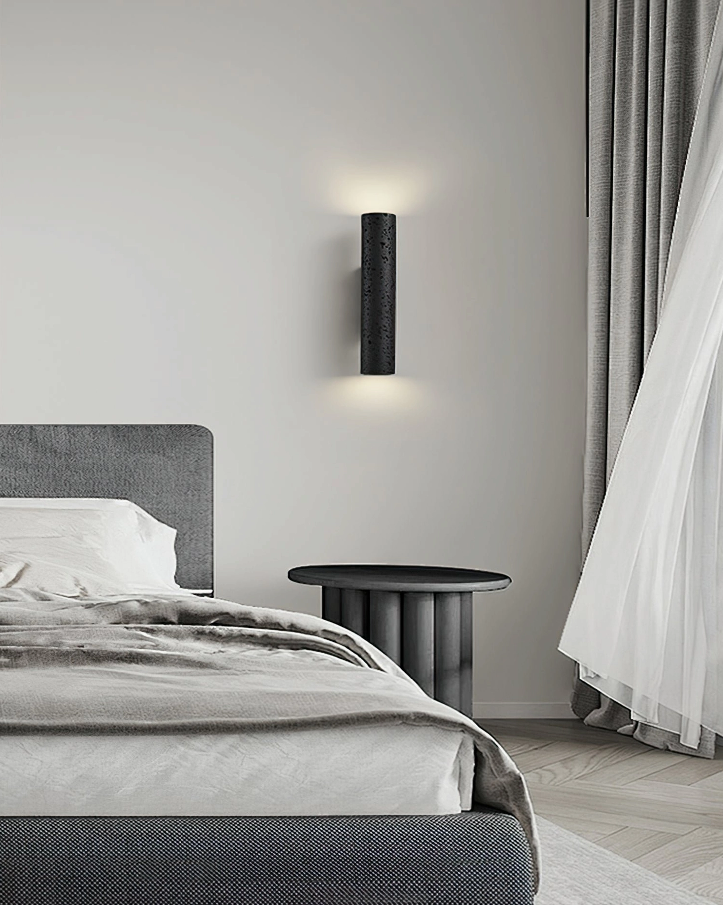 Eye-level bedroom view of Meta wall lamp with sheer curtains, warm ambient travertine stone lighting
