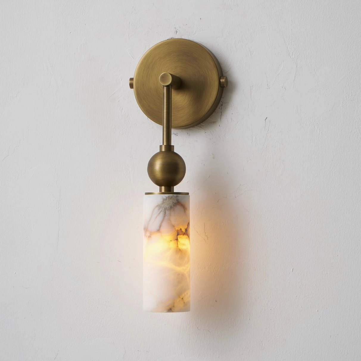 Metro Alabaster wall sconce single-head configuration in bedroom ambient lighting setup