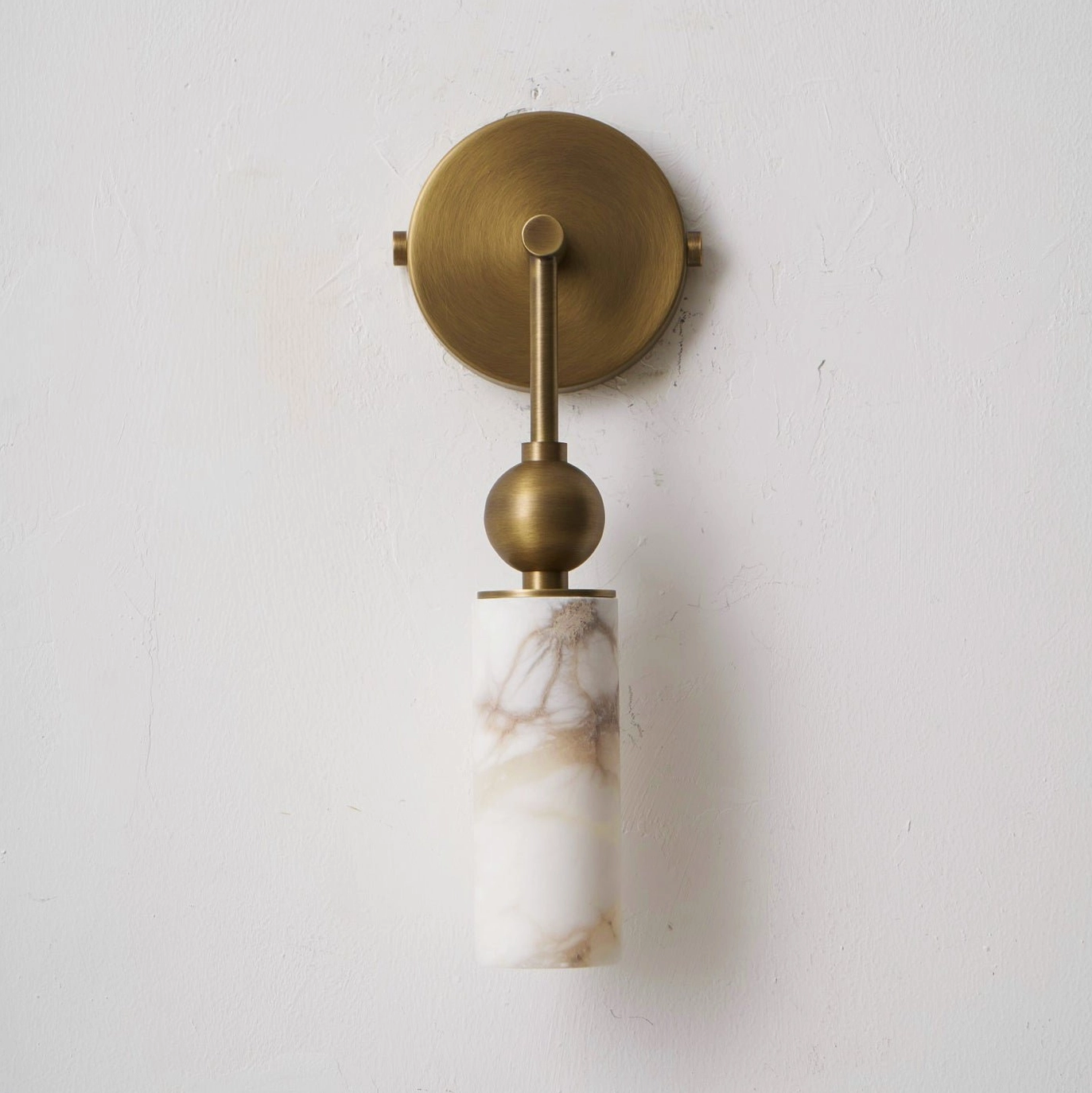 Metro Alabaster wall sconce single-head configuration in contemporary interior design setting