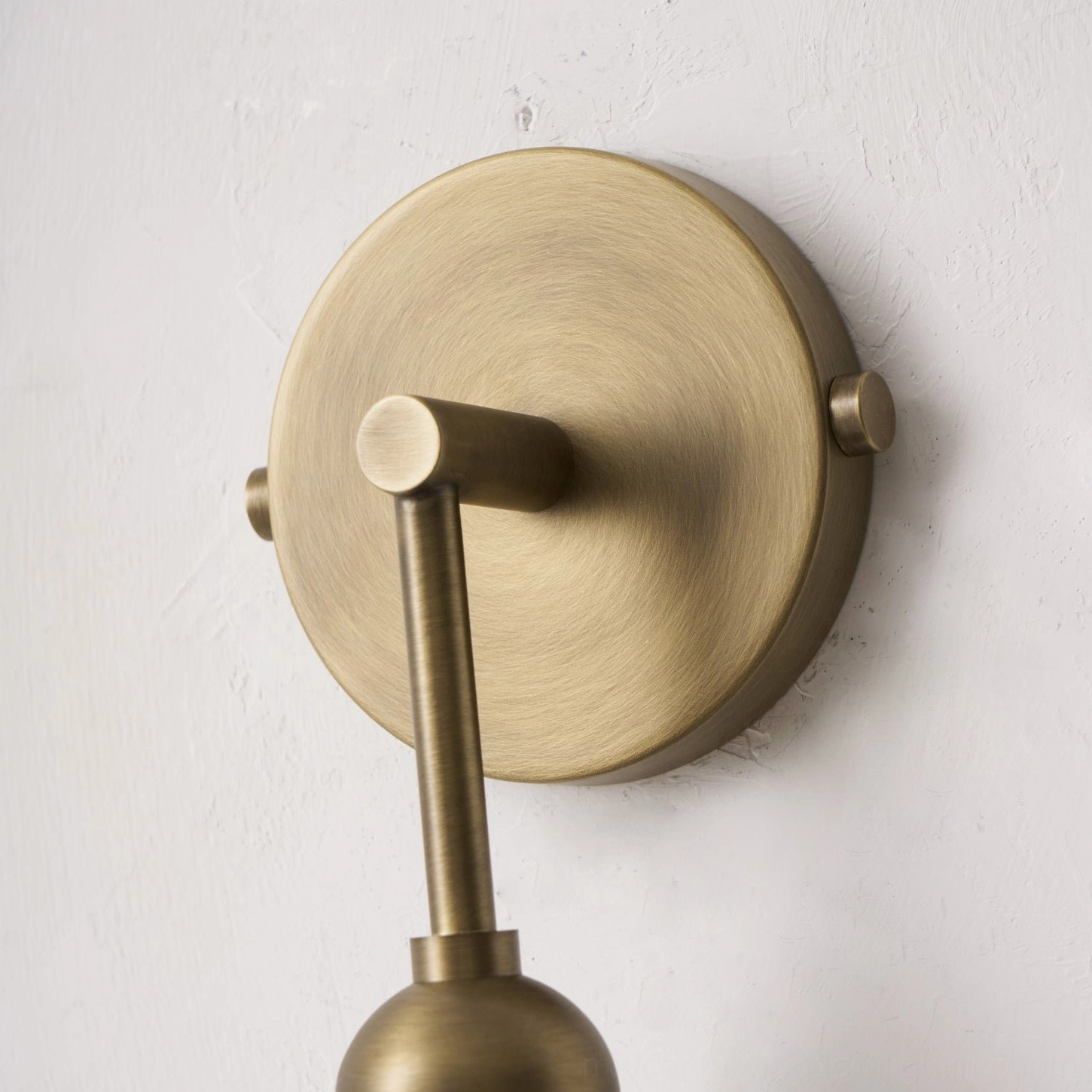 Single-head Metro Alabaster wall lamp in nickel color providing focused accent lighting