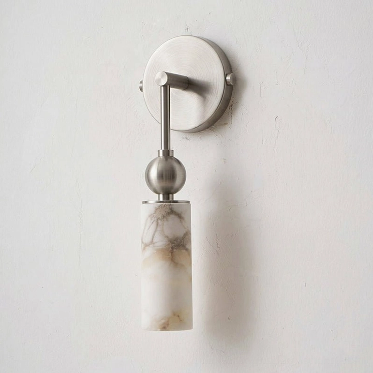 Single-head Metro Alabaster wall sconce in nickel color with natural alabaster shade, bedroom installation