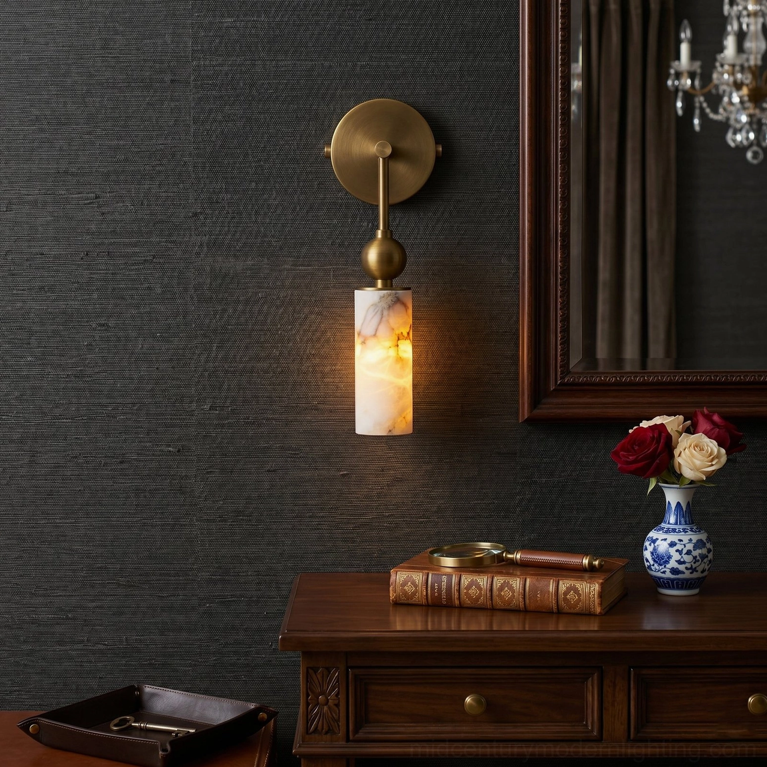 Modern brass and alabaster wall sconce installed in luxury bedroom with warm ambient lighting and textured wall