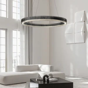 Modern minimalist living room with Meyda black ring pendant light suspended over seating area with large windows