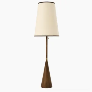 Mezzo mid-century modern floor lamp with tapered walnut wood base and cream fabric shade, front studio view