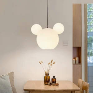 Mickey ceiling pendant light illuminated in minimalist dining corner with warm ambient glow
