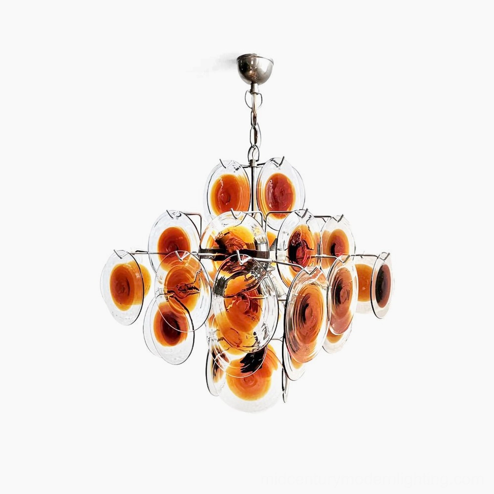 Mid-century modern amber glass disc chandelier with polished nickel frame, frontal studio view