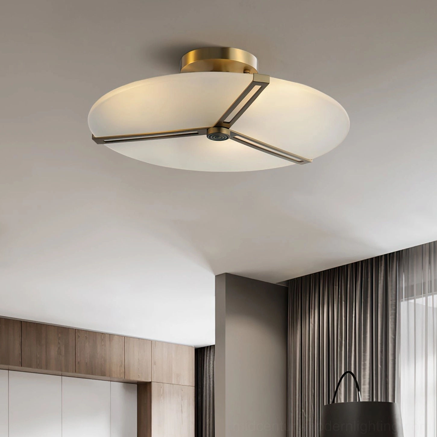 Mid-century modern inspired brass ceiling lamp with pristine frosted glass disc