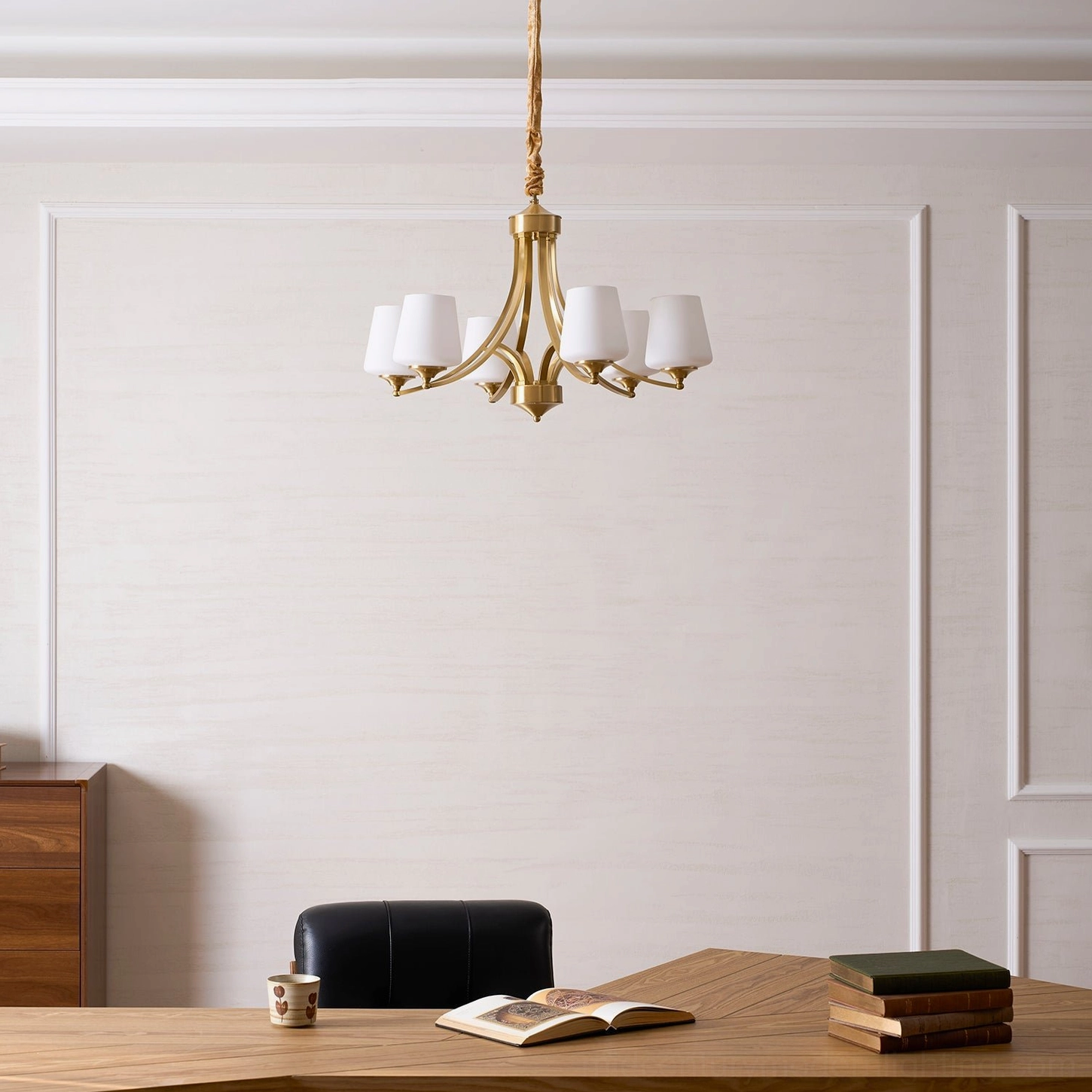 Mid-century modern brass chandelier fixture demonstrating timeless design and warm brass finish
