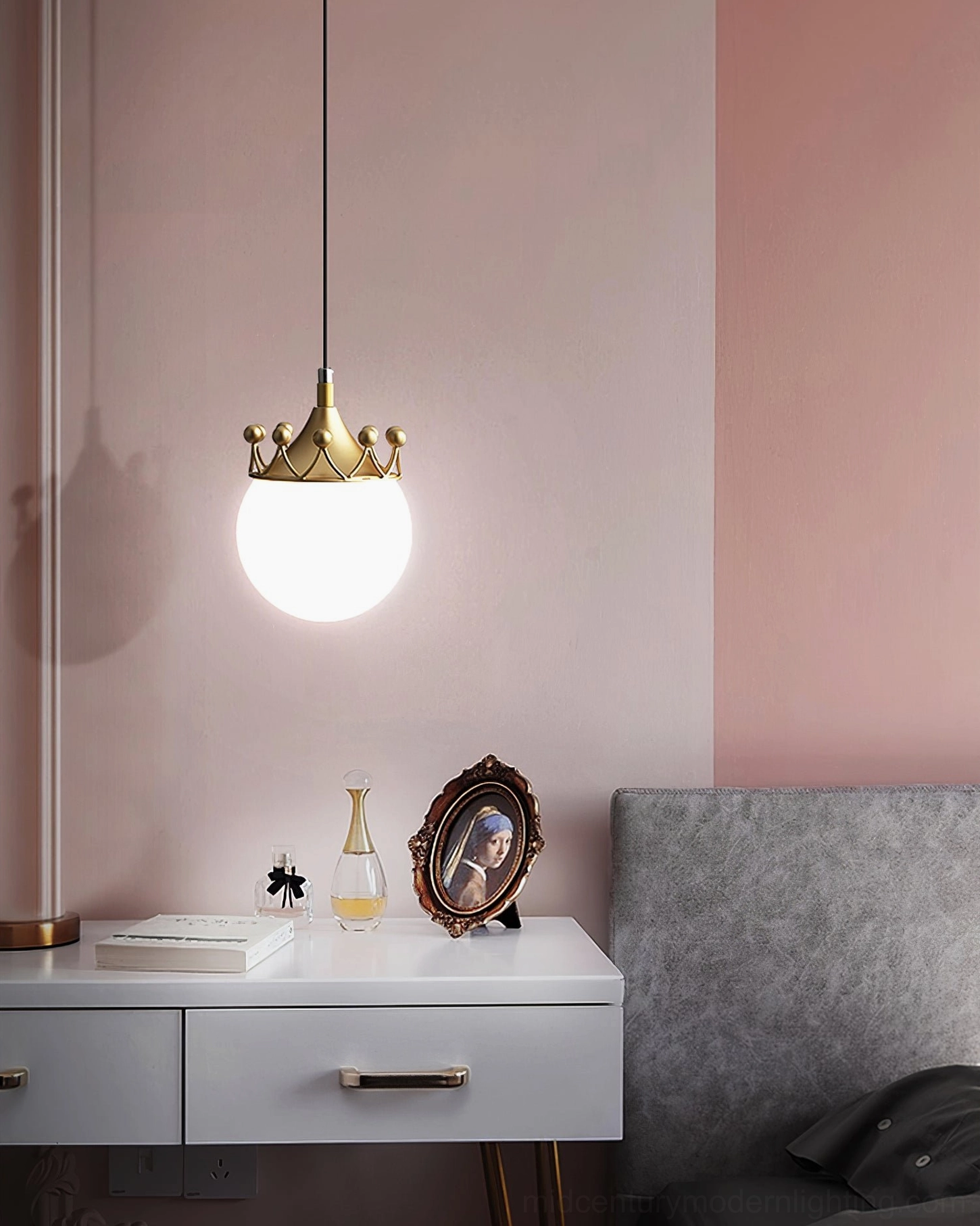 Crown globe pendant ceiling light in modern bedroom corner, side view showing frosted glass diffuser and brass finish details