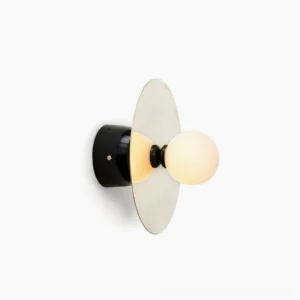 Modern disc and sphere wall sconce with black metal frame and frosted glass globe on white background
