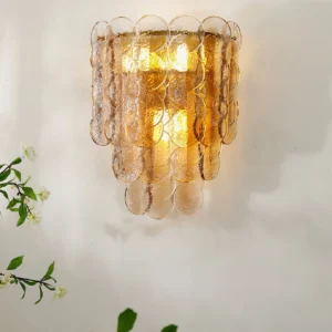 Mid-century modern glass wall lamp with rippled texture panels casting layered light and shadow