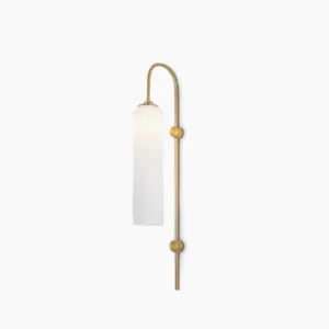 Frosted white cylindrical glass wall sconce with curved brass arm and dual gold accents on white background