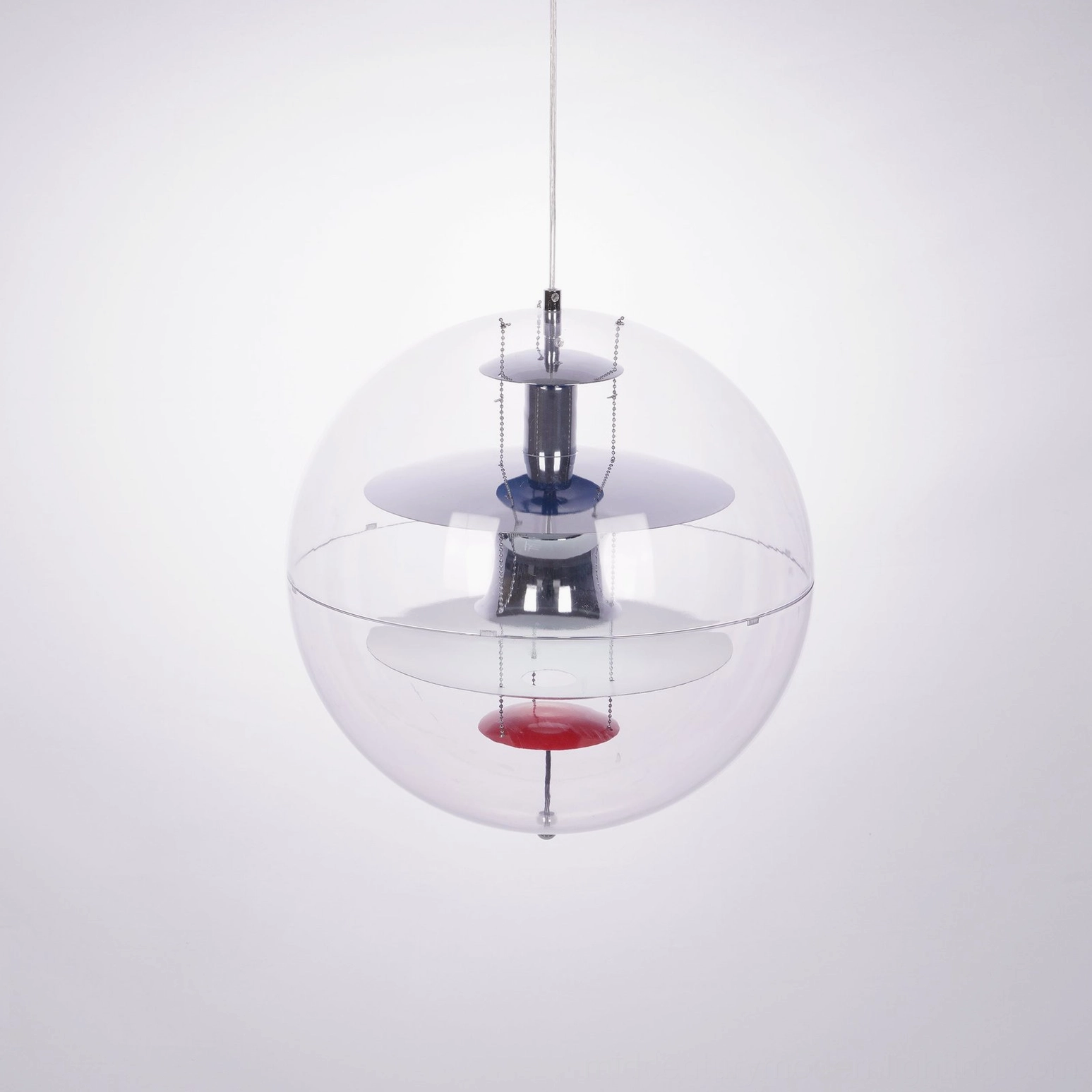Mid-century modern globe pendant with chrome suspension hardware, center blue accent fixture