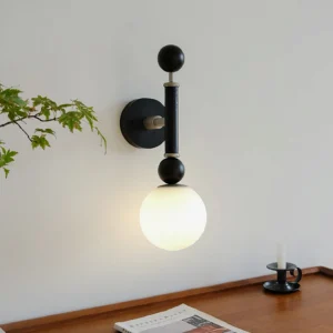 Mid-century modern wall lamp illuminated in home interior with wooden side table, soft ambient lighting effect