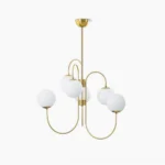 Elegant mid-century modern gooseneck chandelier with brass frame and frosted white glass globes displayed against pure white background