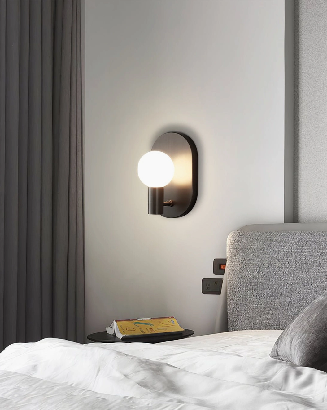 Mid-century modern Kalux wall sconce architectural detail showing brass and glass craftsmanship