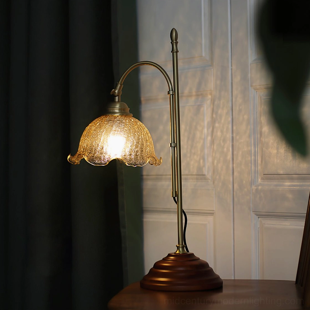 Mid-century modern table lamp with Edison bulb showcasing warm vintage aesthetic in home office