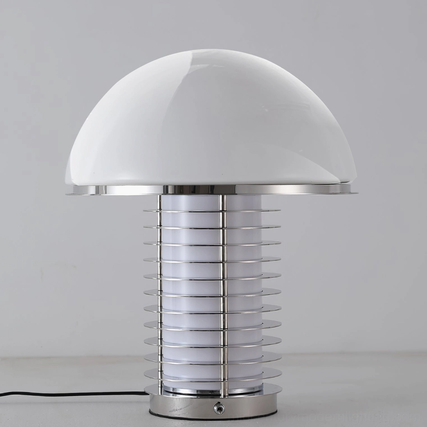 Mid-century modern minimalist table lamp with glossy white dome shade and all-chrome body
