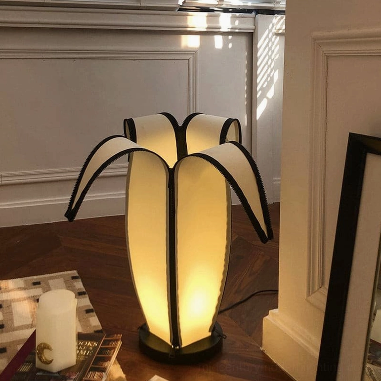 Mid-century modern banana table lamp with organic curves and refined design sensibility