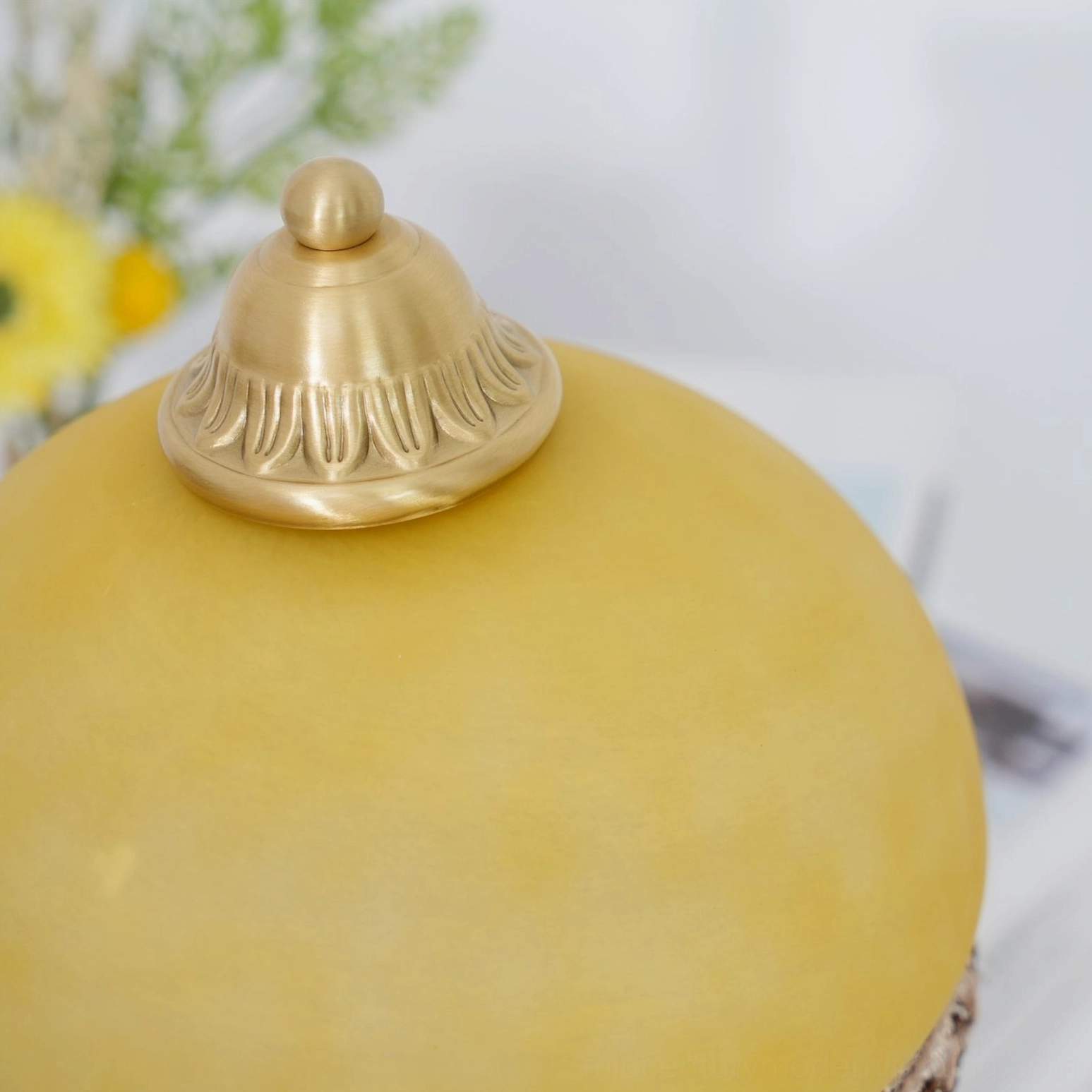 Brass tassel table lamp full product shot in studio lighting showing design details