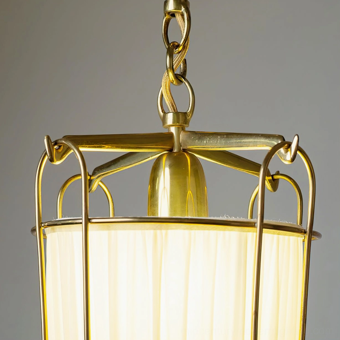 Mid-century modern caged pendant chandelier with geometric brass frame and fabric diffuser shade
