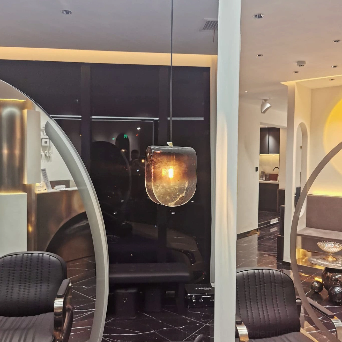 Mid-century modern pendant light fixture with gradient glass and chrome hardware mounting