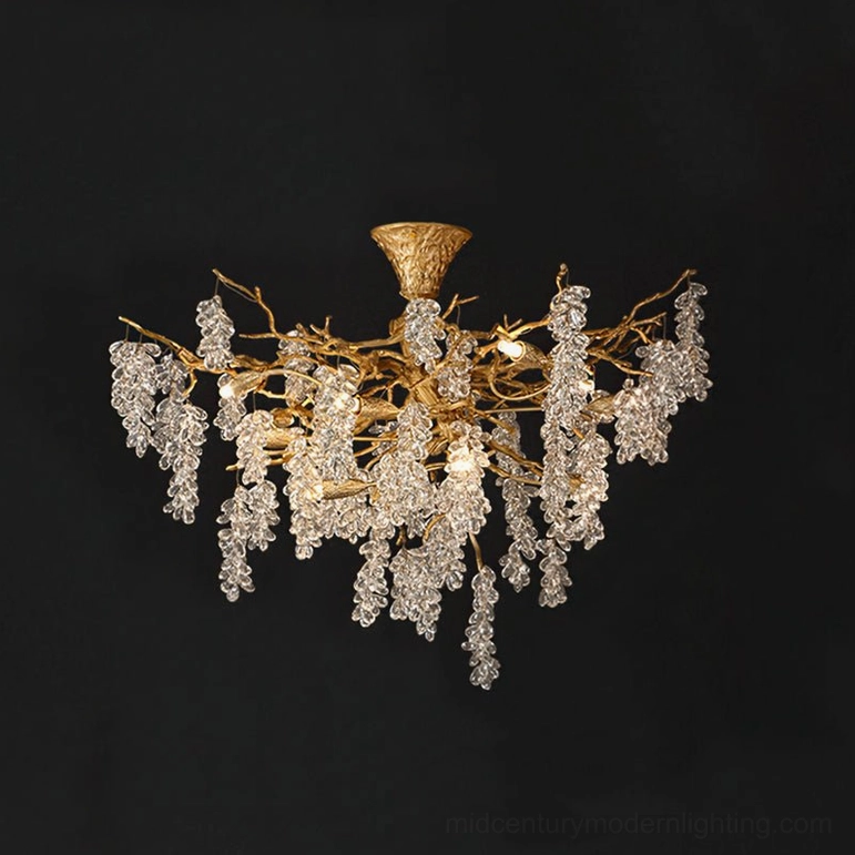 Mid-century modern grape bunch chandelier showcasing warm ambient lighting and sophisticated brass finish