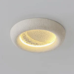 Mid-century modern ceiling light with frosted white matte finish and crescent moon light effect close-up detail