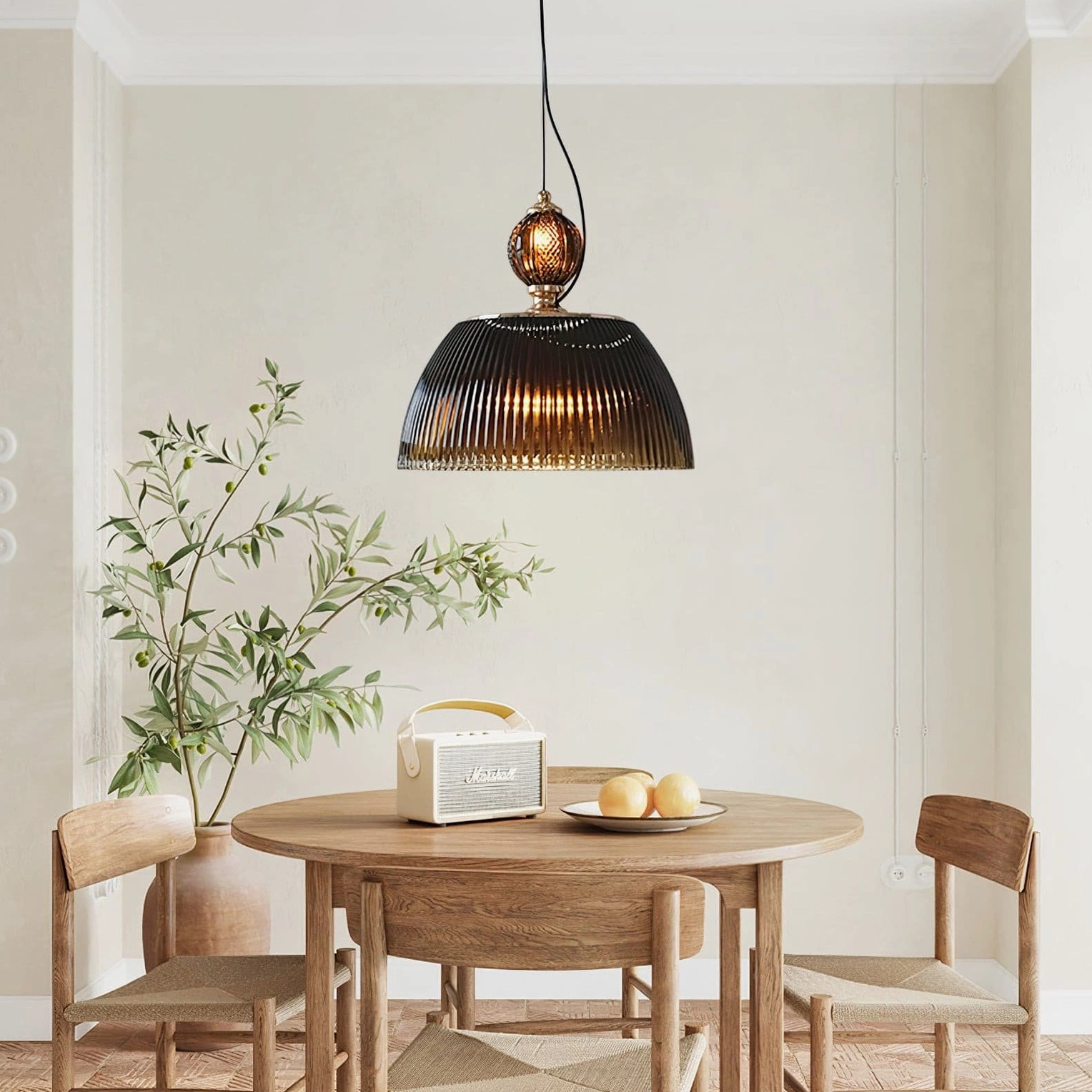 Vintage ribbed glass pendant lamp installed above wooden dining table in warm retro interior design setting