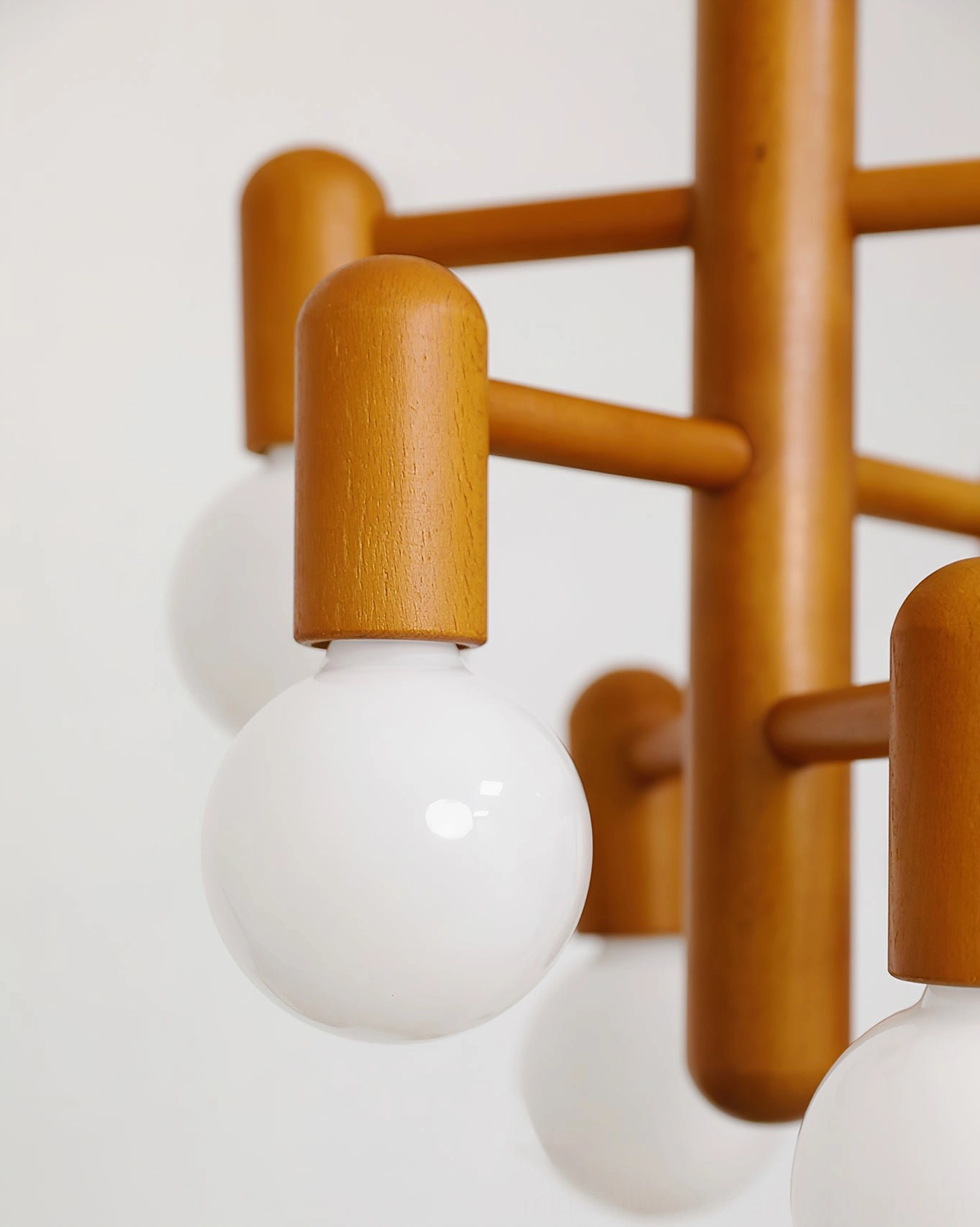 Mid-century modern wood pendant light showing complete fixture design and proportions