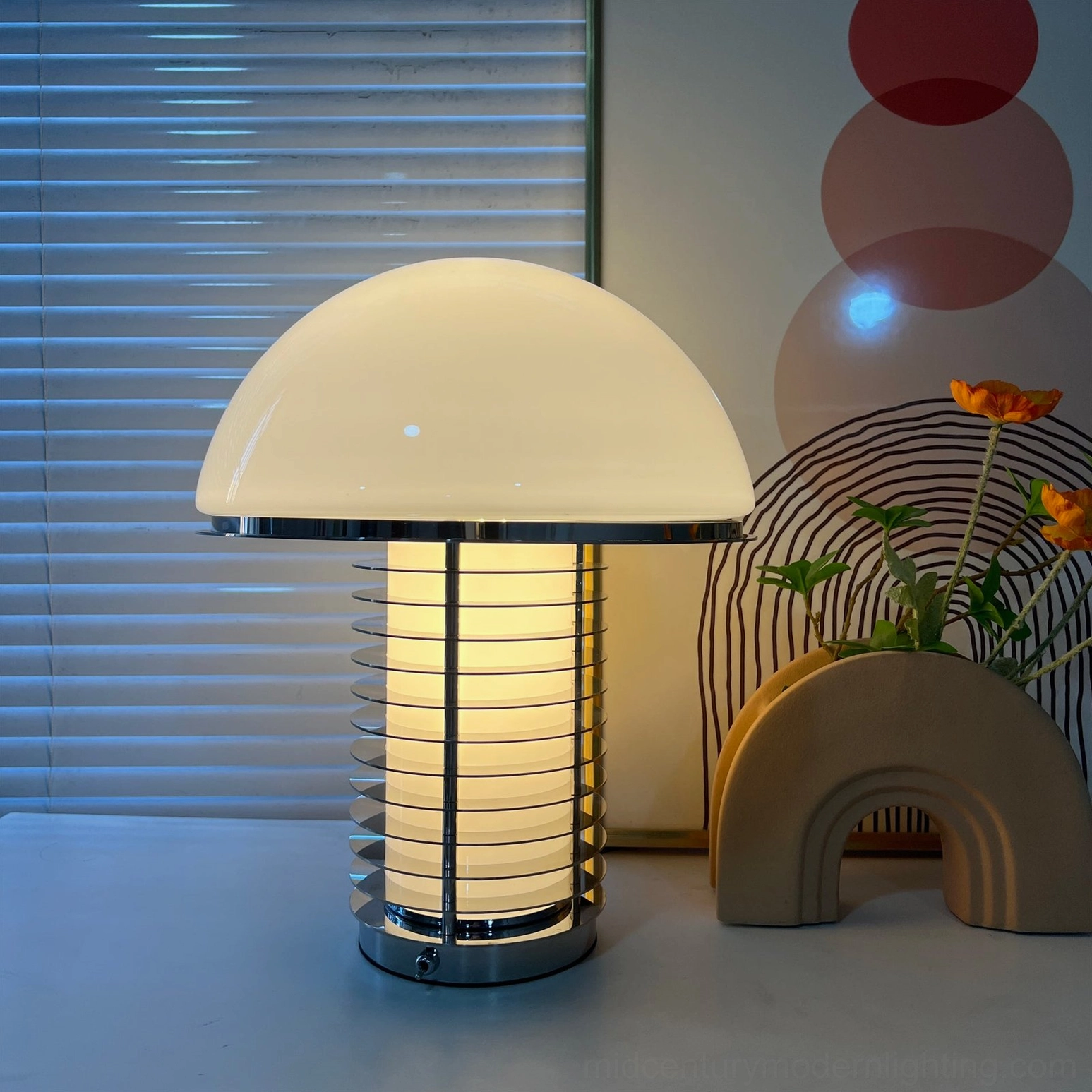 Mid-century modern mushroom lamp in white finish paired with minimalist home decor