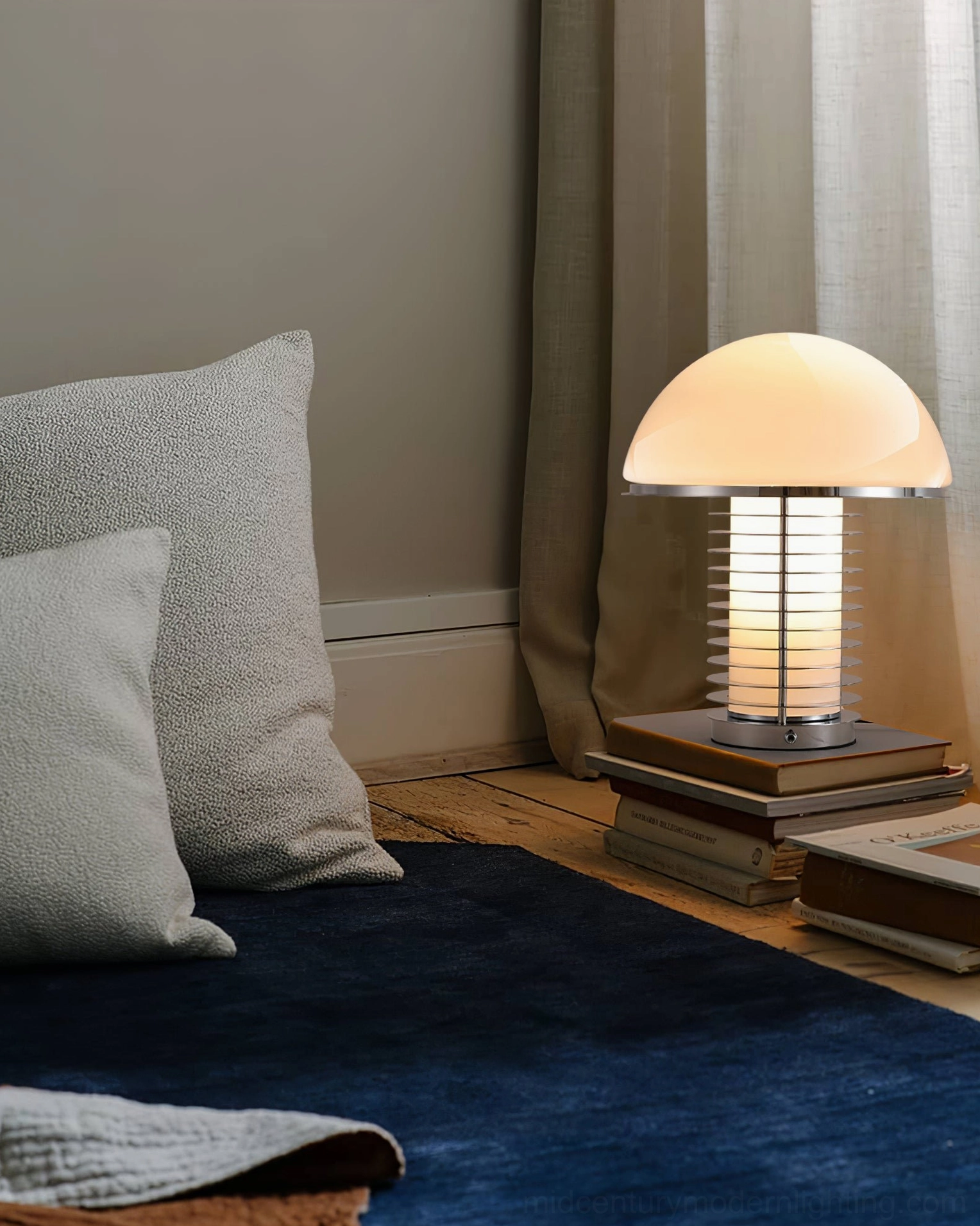 Mid-century chrome mushroom lamp showcasing sculptural form and integrated LED technology