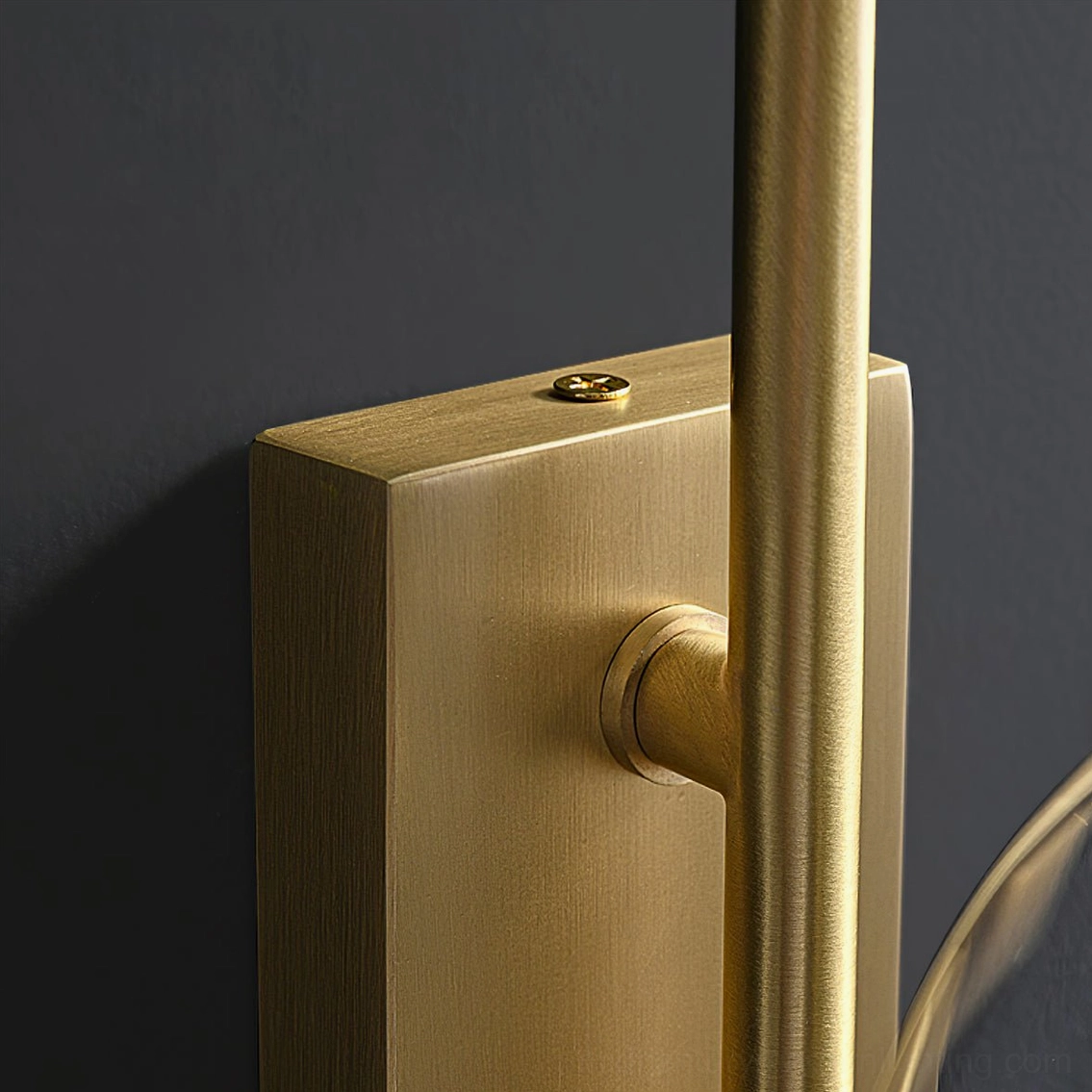 Mid-century modern copper wall sconce creating sculptural focal point on interior wall