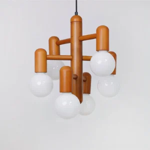Close-up detail of opal glass globes and wooden frame of mid-century pendant fixture
