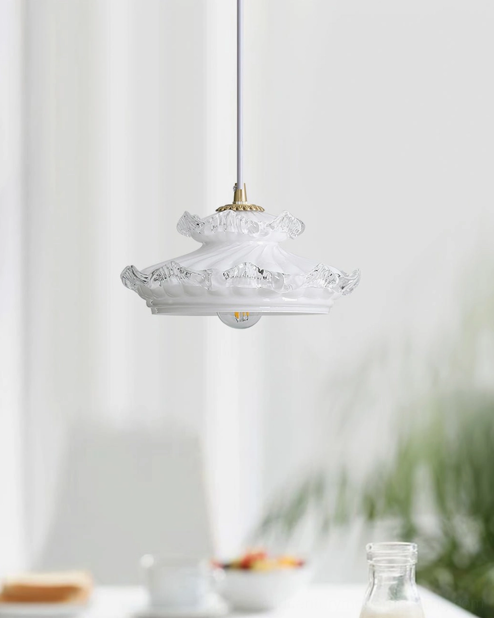 Mid-century pendant lamp with frosted white glass shade and brass suspension system