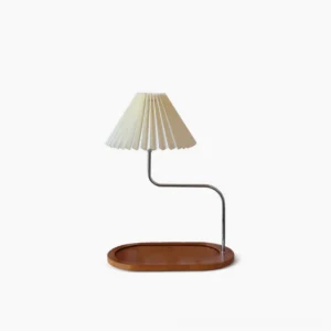 Mid-century modern pleated fabric table lamp with chrome S-curved arm and walnut wooden base, studio front view
