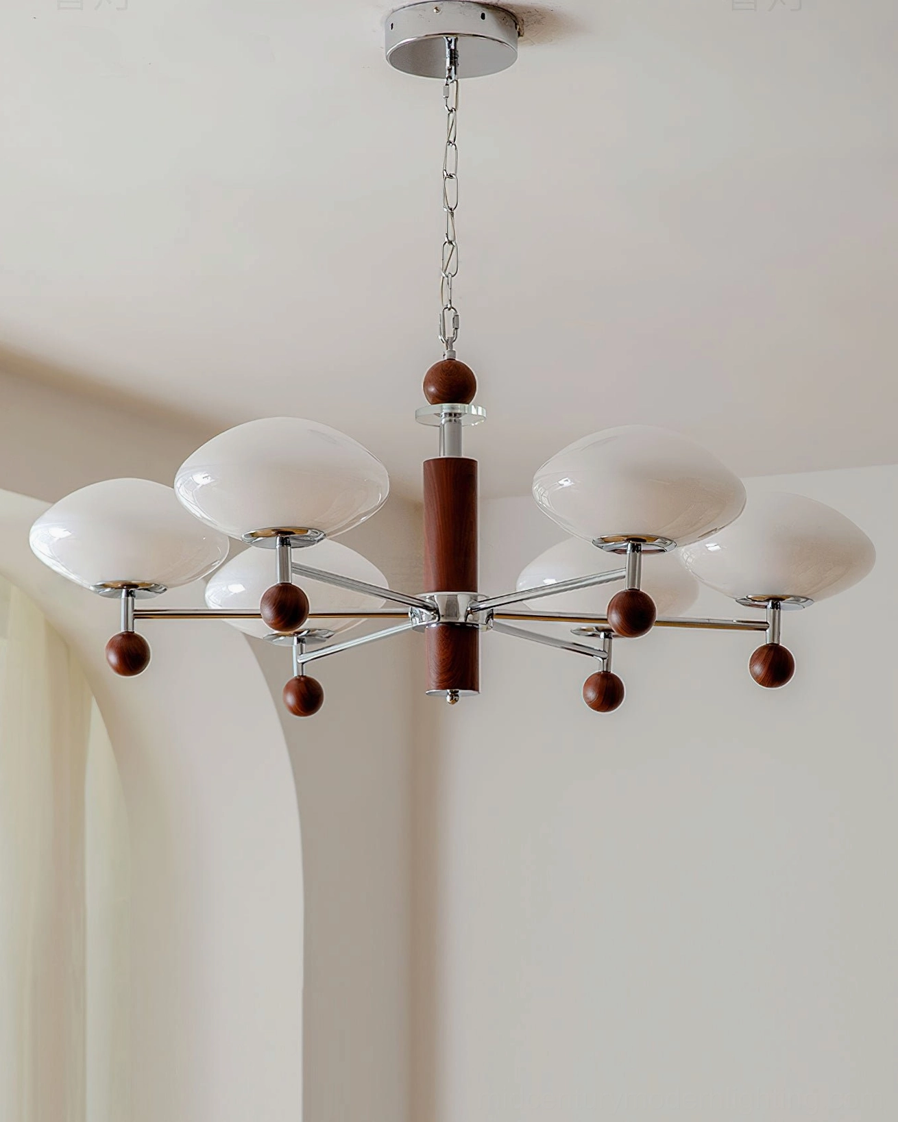 Mid-century modern pointed chandelier architectural detail - chrome and walnut pendant light fixture from studio perspective
