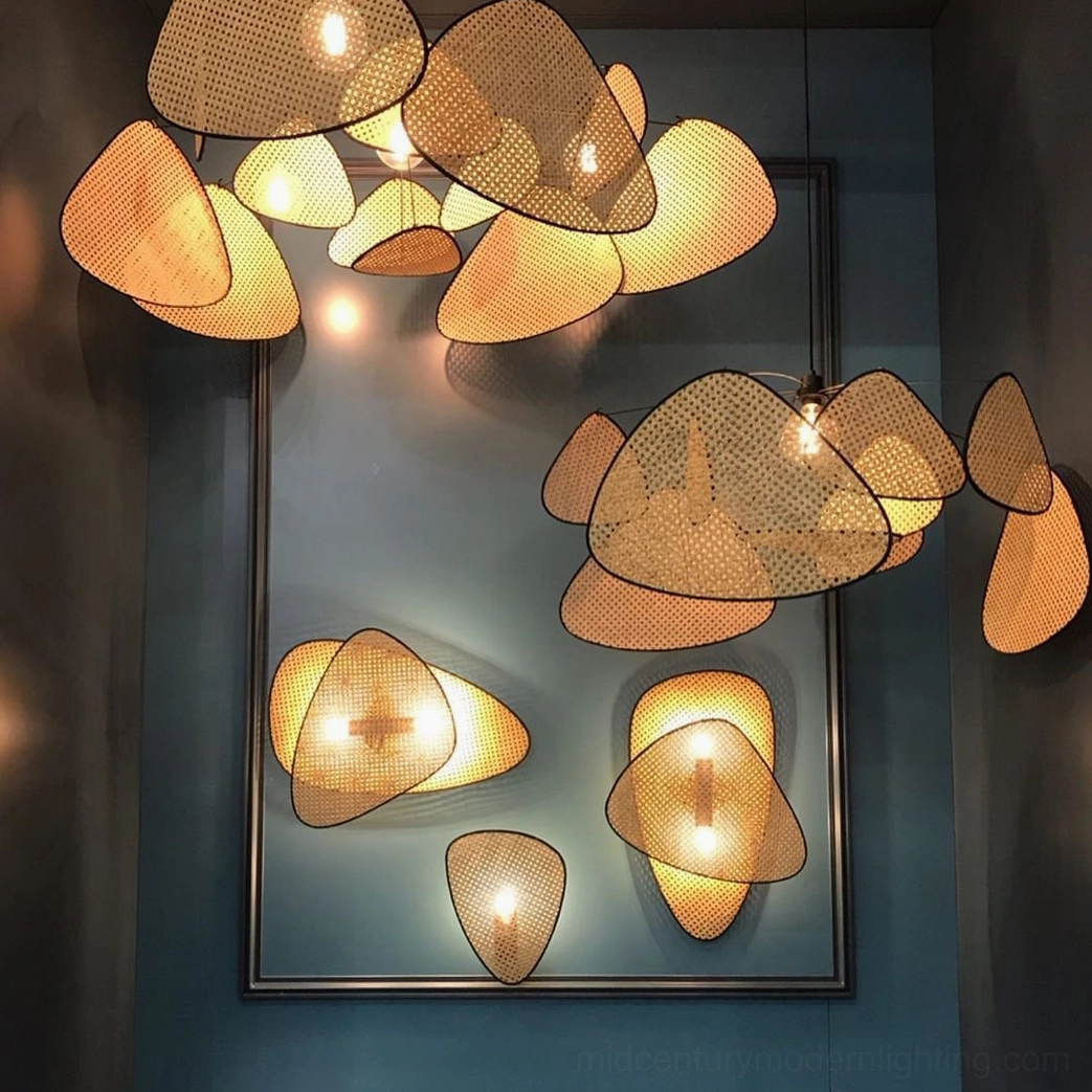 Mid-century modern rattan cannage wall lamp gallery installation showing sculptural presence and design statement