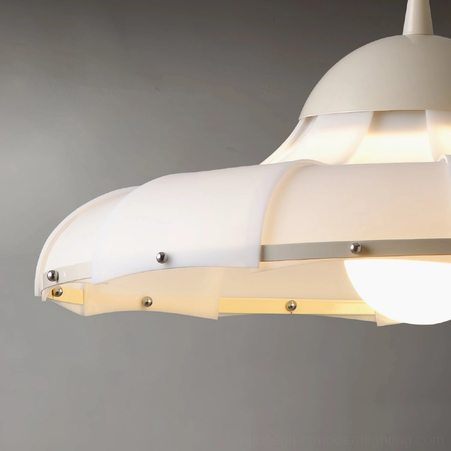 Mid-century modern swirl pendant lamp with organic fluted design in contemporary home lighting setup